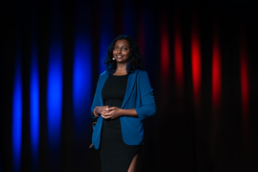 Ishika delivering a Ted Talk.